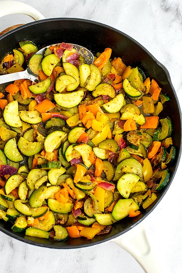 Greek Vegetables in a big bowl with other sides