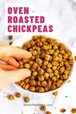 Crispy roasted chickpeas seasoned with ranch flavor in a white bowl.