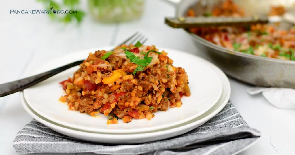  simple low carb cauliflower lasagna on a plate with a fork