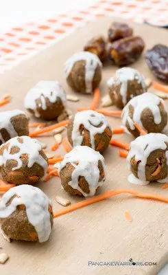 Enjoy the flavors of carrot cake anytime with these simple, healthy no-bake carrot cake energy bites! Raw, vegan, gluten free, paleo, nut free, allergy friendly and super easy to make! Packed with protein, fiber and healthy fats! | www.pancakewarriors.com