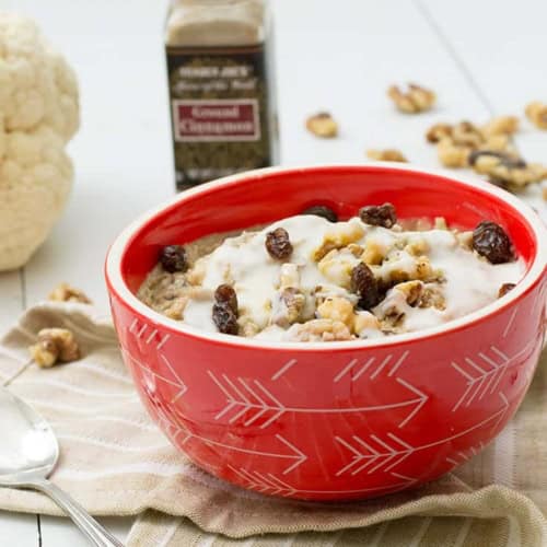 Bursting with flavor this bowl of cinnamon bun caulioats is the perfect breakfast or pre workout meal! If you are trying to get more veggies in your day then this vegan, gluten free, paleo, whole30 approved breakfast is for you!! | www.pancakewarriors.com