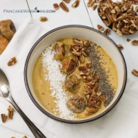 pecan pumpkin pie smoothie bowl with chia seeds, figs and coconut flakes