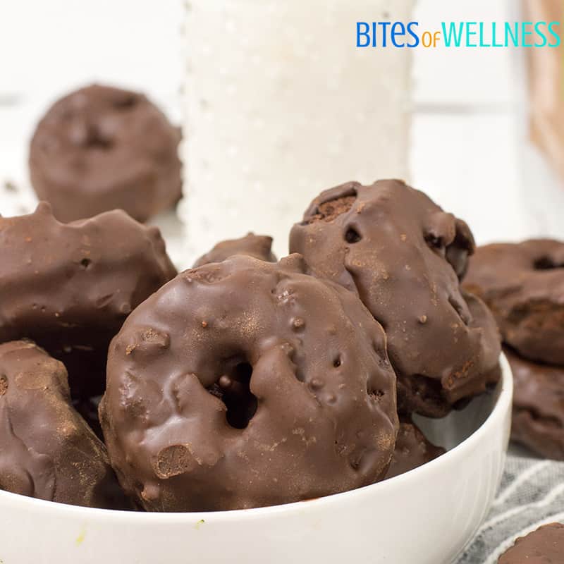 close up picture of gluten free high protein chocolate zucchini donuts in a bowl