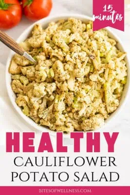 Large white bowl filled with cauliflower potato salad.