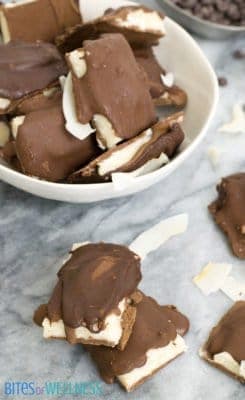These homemade almond joy candy bars are made with 100% real ingredients and have no processed sugar. Gluten free, grain free, paleo friendly, and vegan. | bitesofwellness.com #dessert #vegan #dairyfree