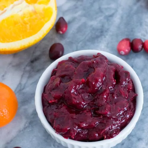 This orange ginger homemade cranberry sauce is naturally sweetened and will be your new favorite way to enjoy cranberry sauce. Vegan, paleo and ready in 7 minutes. | bitesofwellness.com
