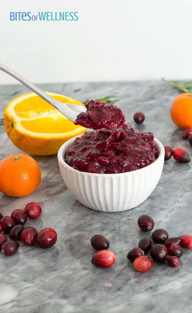 Spoon full of orange ginger homemade cranberry sauce