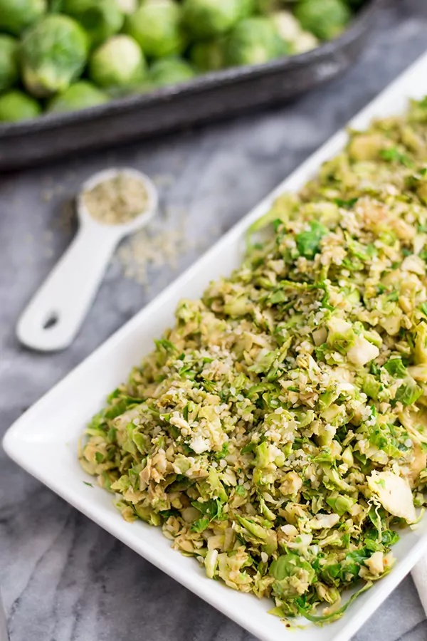 Shaved brussels sprouts salad with creamy balsamic dressing