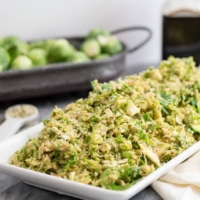shaved brussels sprouts piled high on a serving dish