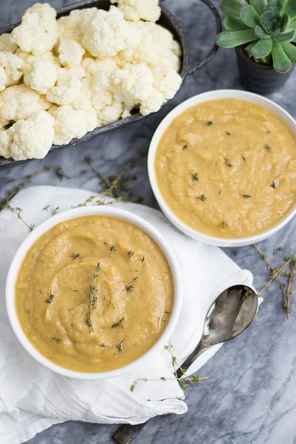 Two bowls of slow cooker cauliflower soup 