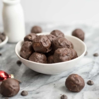 Best ever no bake eggnog truffles are the perfect way to get my eggnog fix! They are dairy free, gluten free, grain free and paleo with a vegan option! And they could not be easier to make! All you need is your food processor and a few simple ingredients! #glutenfree #dairyfree #vegan | https://bitesofwellness.com