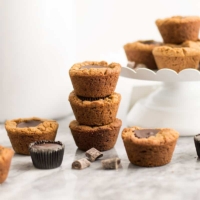 Chocolate combined with peanut butter, is there anything better? These dark chocolate peanut butter cup cookies are my new all time favorite and they will be yours too! #glutenfree #vegan | https://bitesofwellness.com