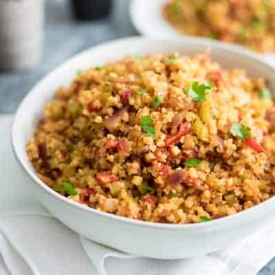 This easy grain-free whole30 cauliflower dirty rice is the perfect weeknight meal. Ready in 15 minutes and full of flavor. Grain free, paleo, vegan, whole30, gluten free. #whole30 #grainfree #paleo #vegan