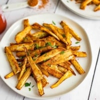 Cajun Parsnip Fries on a white plate