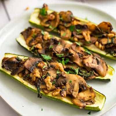 Mushroom Walnut Stuffed Zucchini