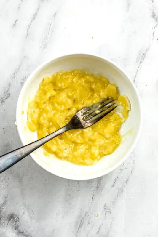 Mashed banana in a bowl.