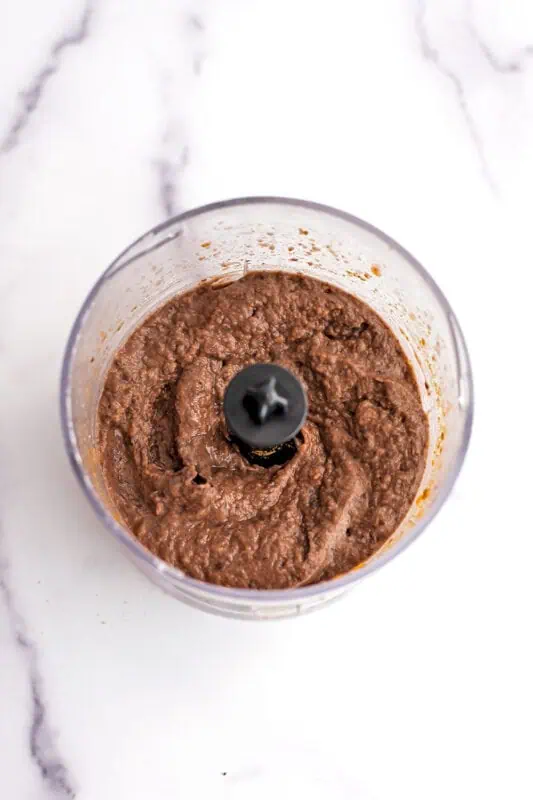 Black bean dip in food processor after blending.