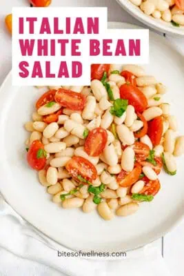 White plate filled with Italian White Bean Salad.