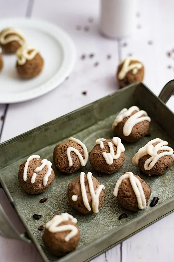 Green tray filled with mocha quinoa energy bites