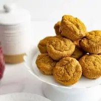 White serving plate filled with gluten free almond flour muffins