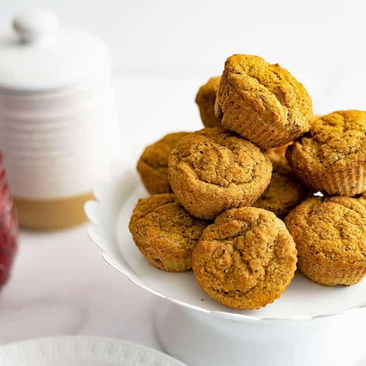 White serving plate filled with gluten free almond flour muffins
