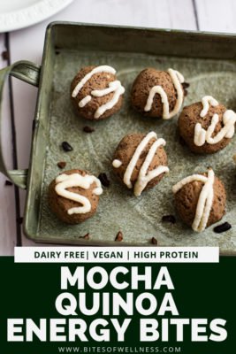 Green tray filled with mocha quinoa energy bites with pinterest text on the bottom of the photo