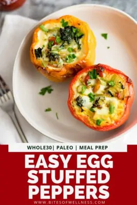 Two easy egg stuffed peppers on a plate with a fork to the left of the plate. Pinterest text on the bottom of the photo