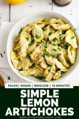 Overhead shot of simple lemon artichokes in a round bowl with pinterest text at the bottom