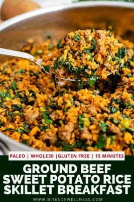 Large serving spoon scooping out a serving of the easy ground beef sweet potato rice breakfast skillet recipe with the skillet full of the recipe below the spoon. Pinterest text on the bottom of the photo