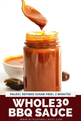 Large jar of Whole30 BBQ sauce with a spoon full of BBQ over the jar and dates in the background with pinterest text on the bottom
