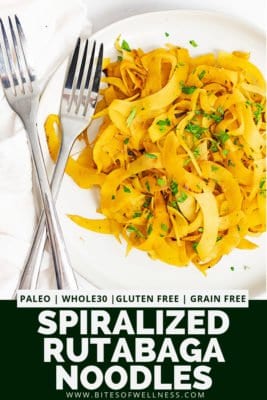 White plate filled with spiralized rutabaga recipe with two forks on the left side of the plate and a white napkin on the side and pinterest text at the bottom of the photo