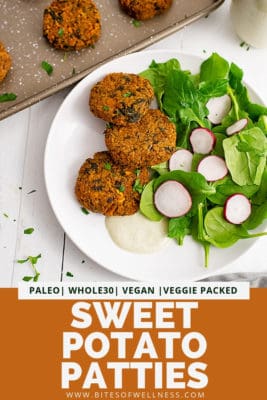 Sweet potato patties next to a small salad on a white plate. In the background you can see the baking sheet. Pinterest text on the bottom of the photo