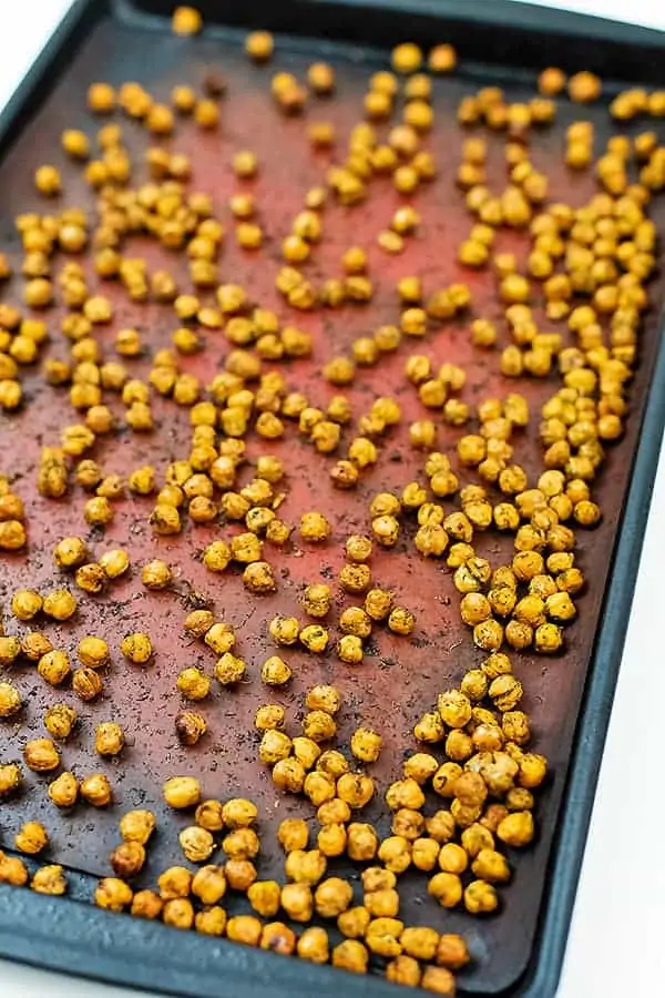 Baking sheet full of ranch roasted chickpeas after cooking