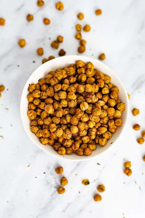 Overhead shot of a large white bowl filled with ranch roasted chickpeas