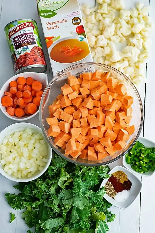 Display of all the ingredients needed for spicy sweet potato soup