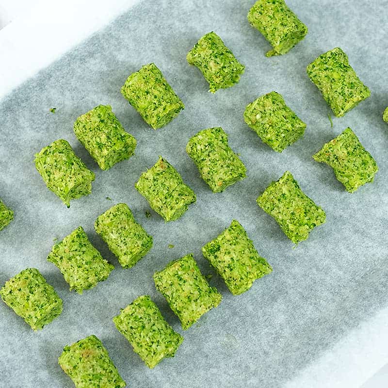 Tray full of broccoli tots before baking.
