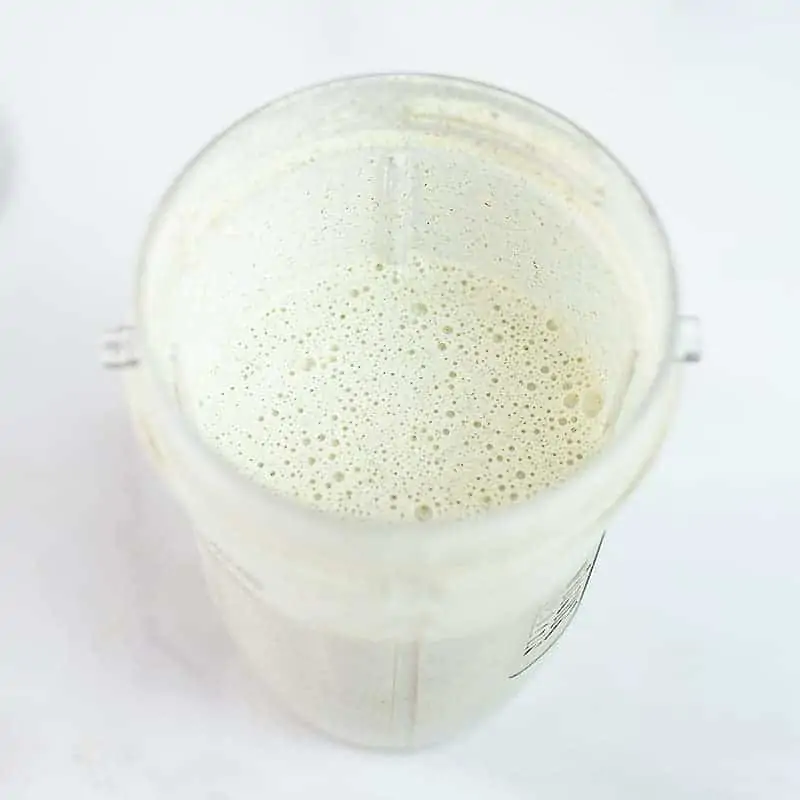 Creamy garlic sauce in a blender