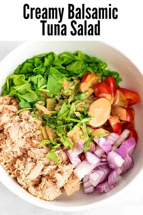 Bowl filled with Creamy Balsamic Tuna Salad ingredients before stirring.