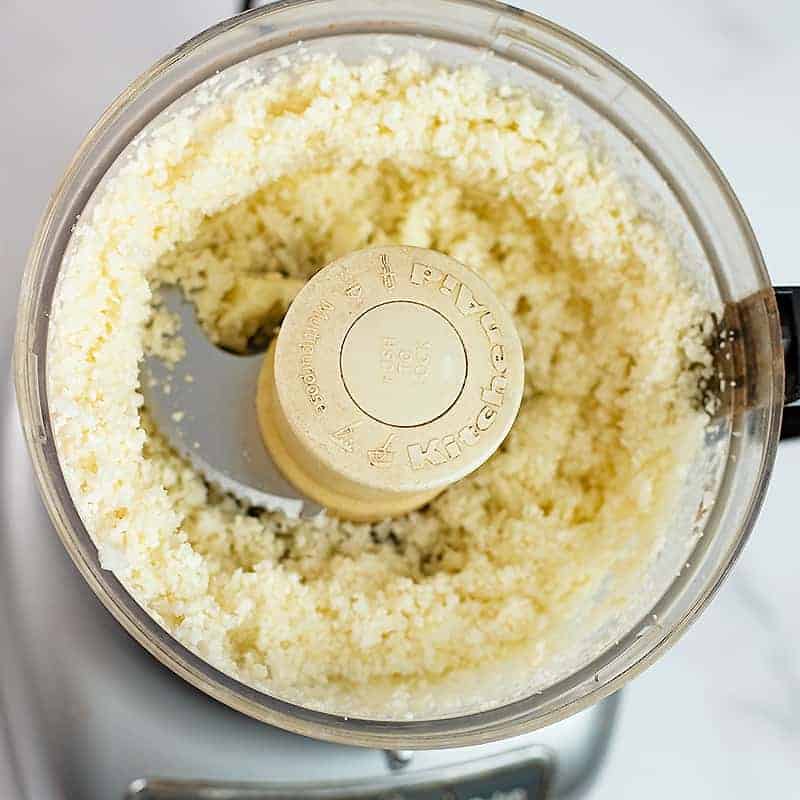 Riced cauliflower in a food processor.