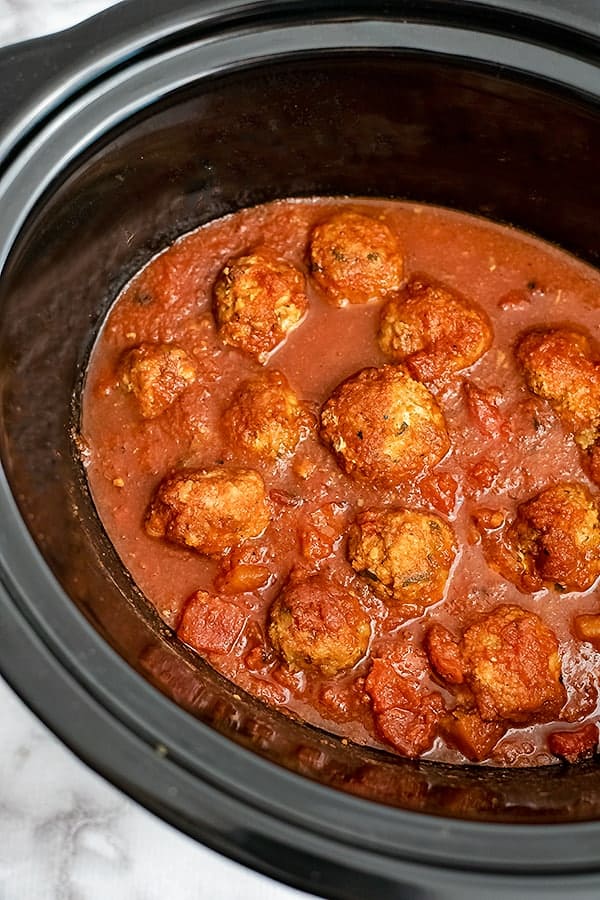 Crockpot filled with Whole30 Slow Cooker Turkey Meatballs