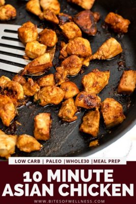 Cast iron skillet filled with asian chicken with silver spatula.