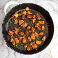 Cooked Asian Chicken in a skillet.