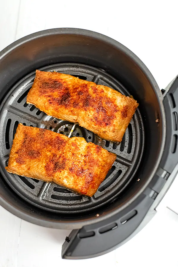 Close up of air fryer salmon after cooking