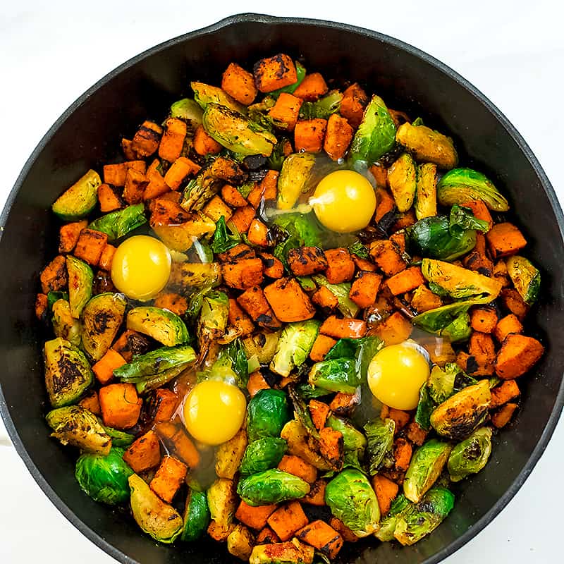 4 eggs cracked in a the sweet potato skillet. 
