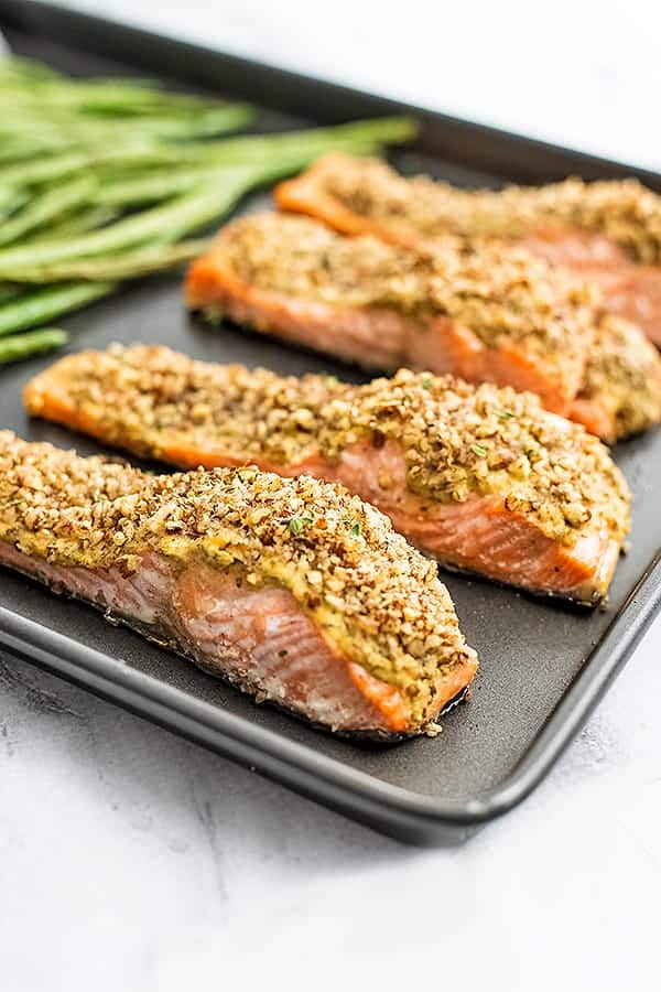 Baking sheet with pecan crusted salmon filets.