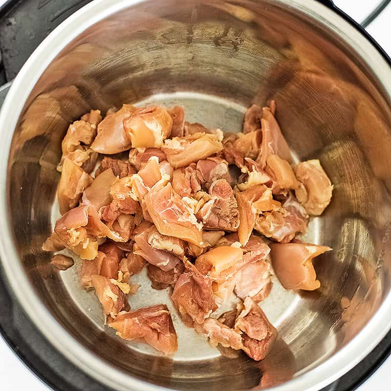Cubed chicken in instant pot.