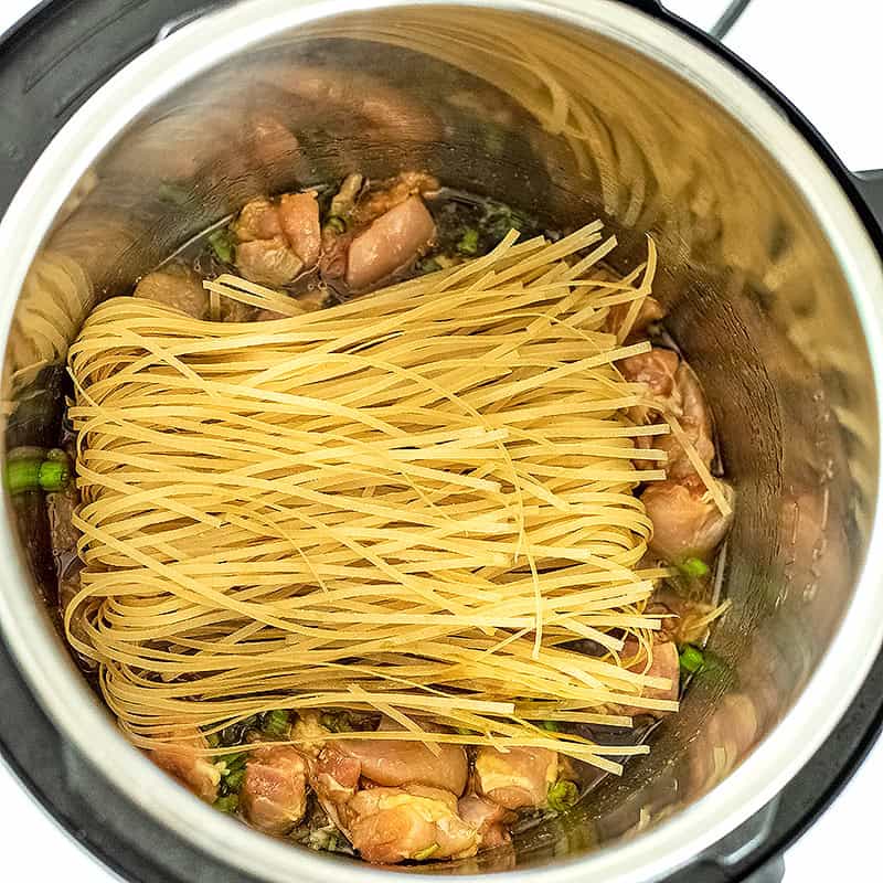 Rice noodles on to of chicken mixture in instant pot.