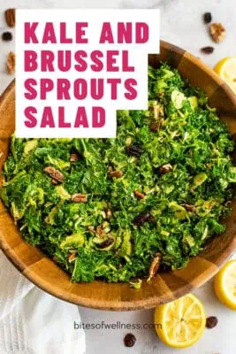 Wood bowl filled with kale and brussel sprouts salad
