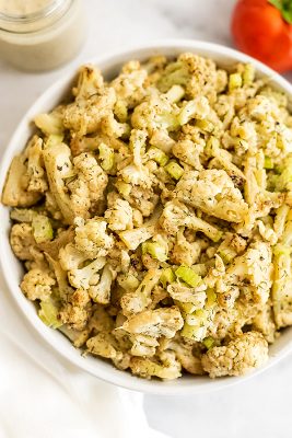 Large bowl filled with cauliflower potato salad.