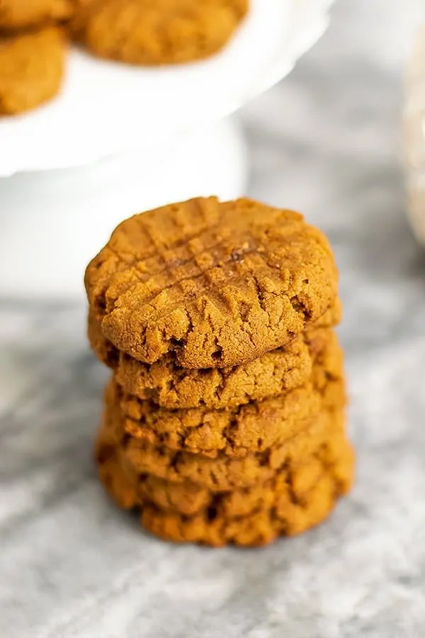 6 peanut butter cookies stacked on top of each other.